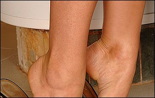 Linda Brown enjoying foot fetish sex with repairman